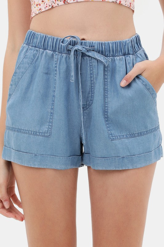 model is wearing Blue Solid Drawstring Shorts