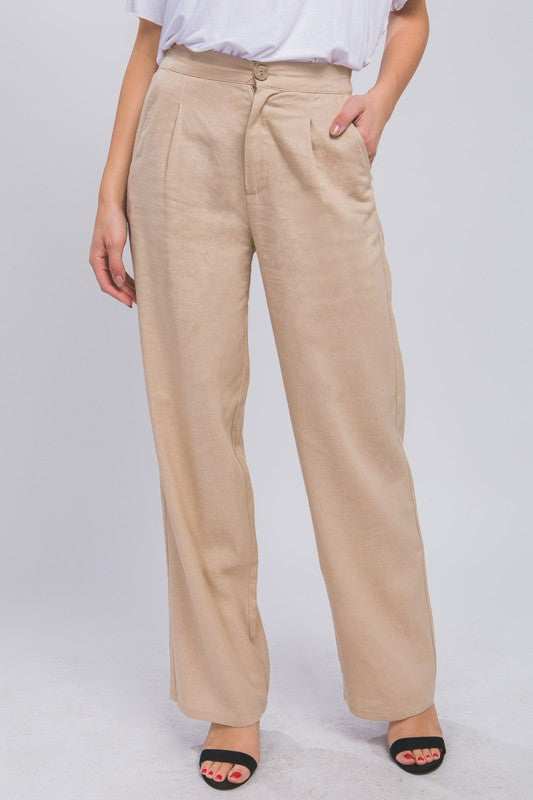 model is wearing Khaki Linen Front Creased Pants with white blouse and black heel sandals