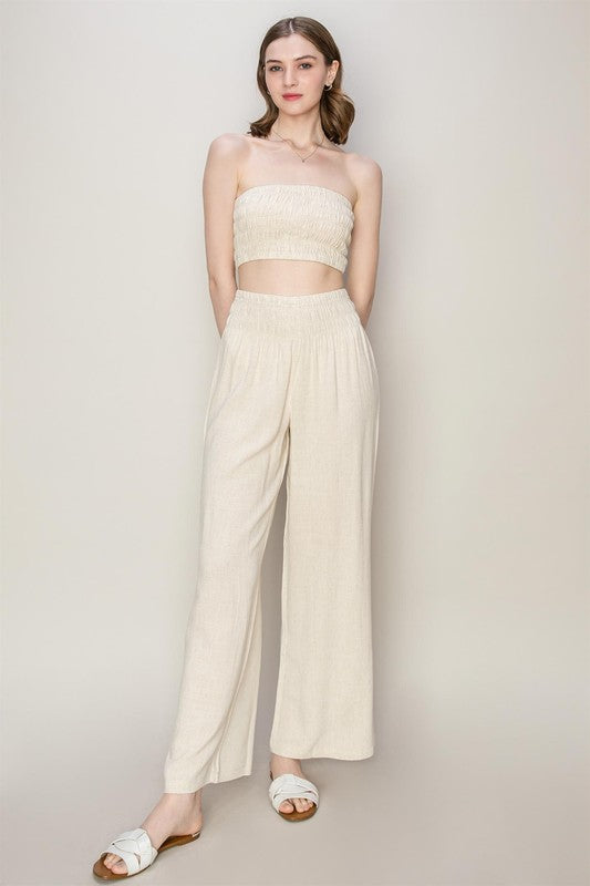 model is wearing Oatmeal Tube Top Pants Set with white flats