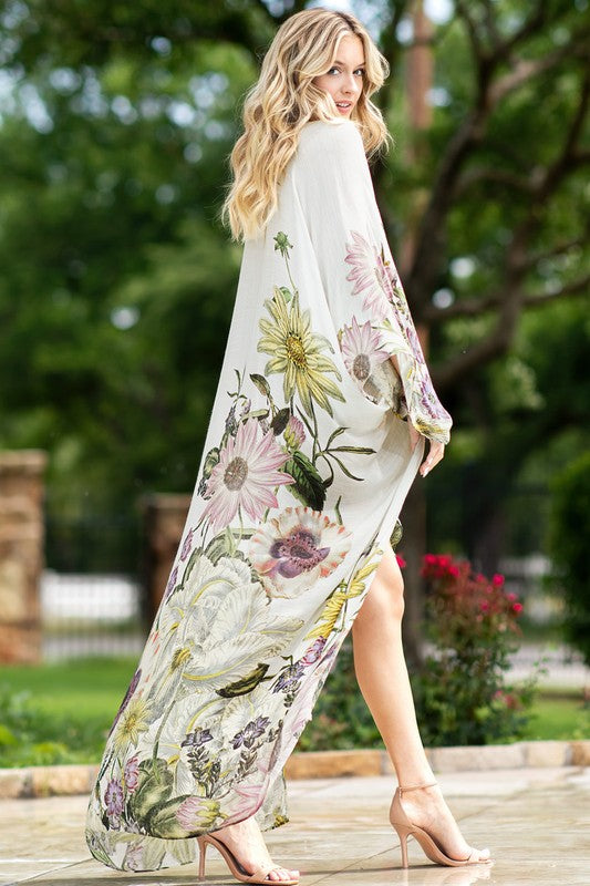 side of the model wearing Aurelia Airy Floral Duster Kimono with beige high heels 