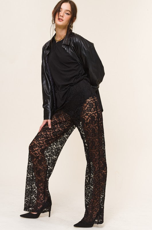  Model is wearing Black Lace Ruby Pants with black tee, black leather jacket and black heels 
