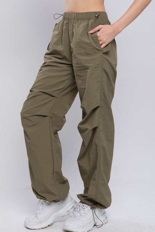 STYLED BY ALX COUTURE MIAMI BOUTIQUE Loose fit parachute pants as a basic pant and essential clothing
