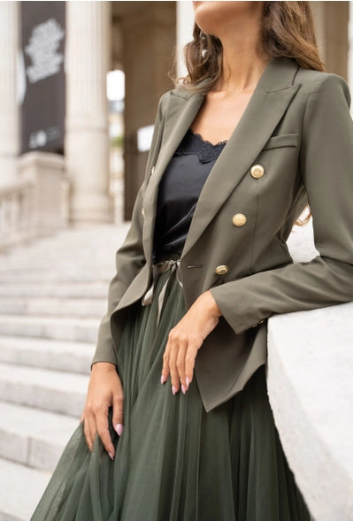model is wearing Khaki Fitted Blazer Jacket with a lace black silky look top and green skirt 