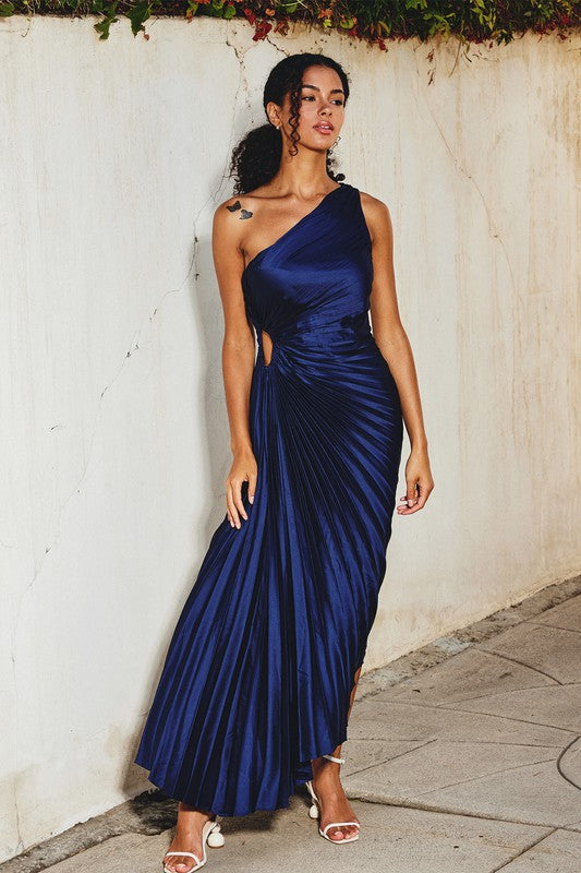 model is wearing Navy Olympia Asymmetrical Maxi Dress  with white heels 