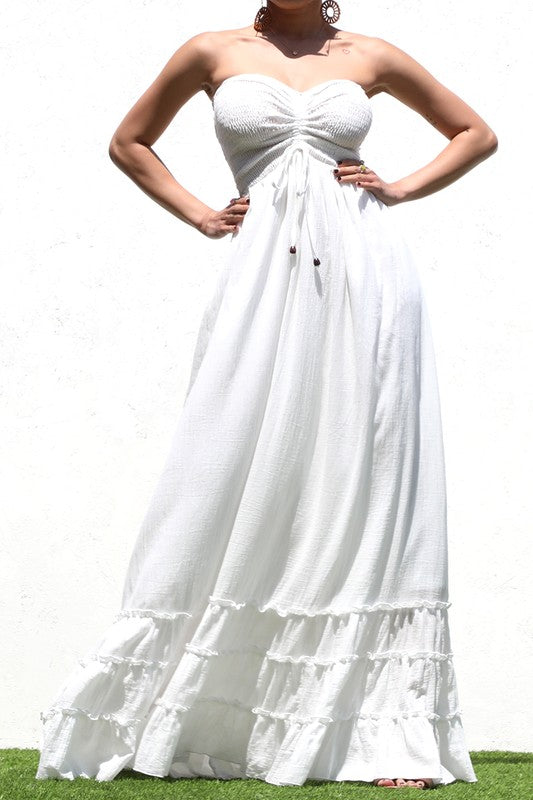 model wearing Off White Smocked Maxi Dress with ring earrings 