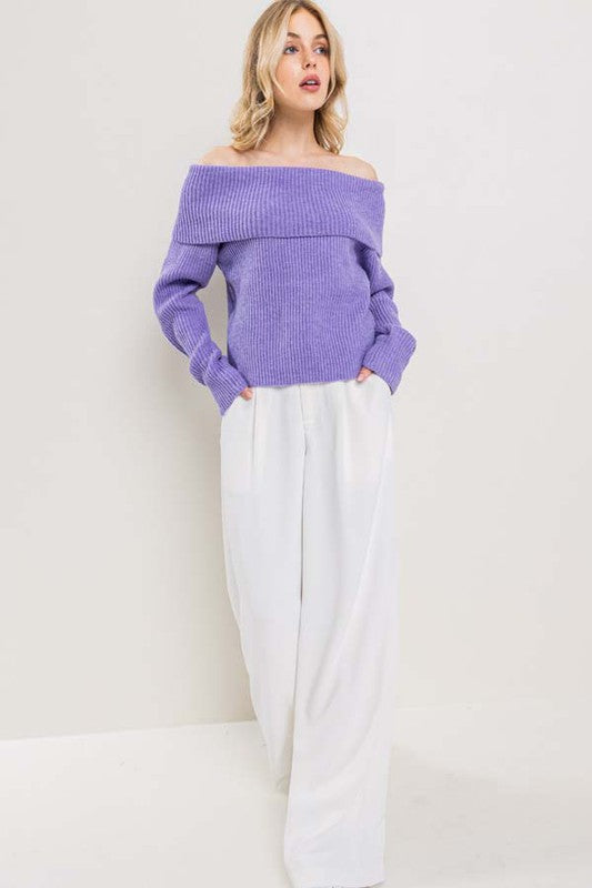 model is wearing White Wide Leg Pants and a purple sweater 