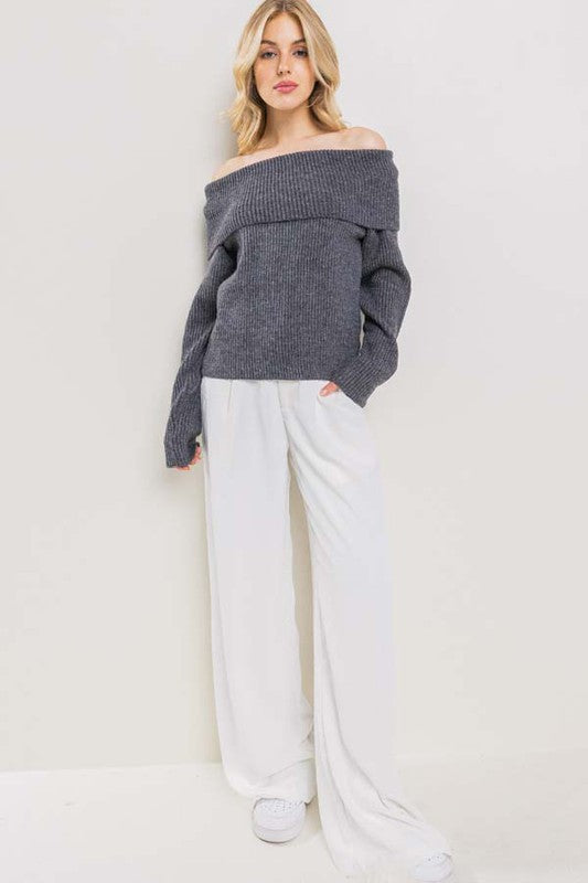 model is wearing White Wide Leg Pants and off shoulder grey sweater