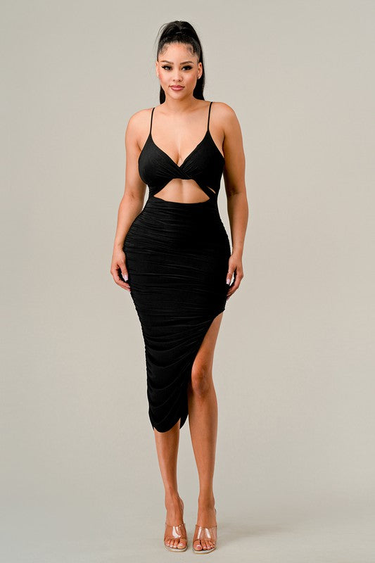 STYLED BY ALX COUTURE MIAMI BOUTIQUE Model is wearing black Spaghetti Strap Cutout Midi Dress with high heels 