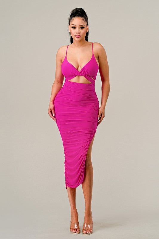 STYLED BY ALX COUTURE MIAMI BOUTIQUE Model is wearing Fuchsia Spaghetti Strap Cutout Midi Dress with high heels. Front view 