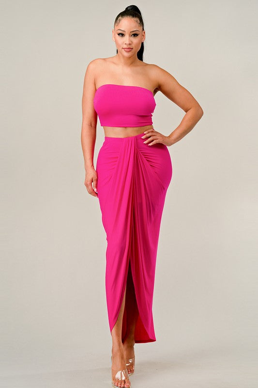 STYLED BY ALX COUTURE MIAMI BOUTIQUE Model is wearing Fuchsia Tube Top and Long Skirt Set with high heels 
