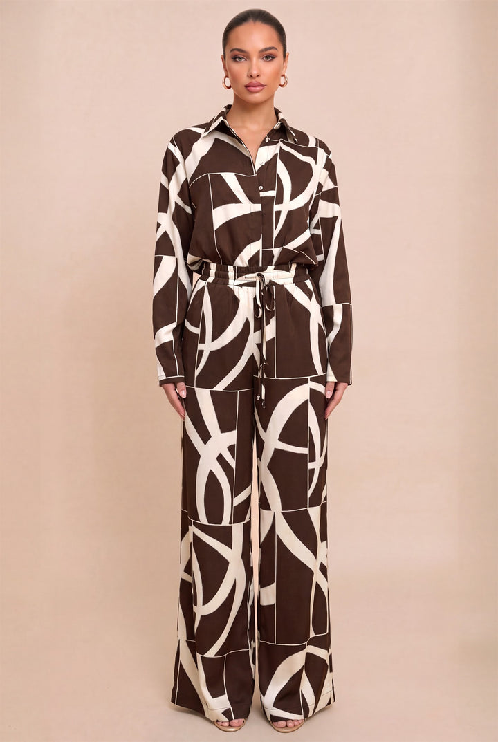 Front view of Luxxel ivory and brown abstract print shirt and wide-leg pant set