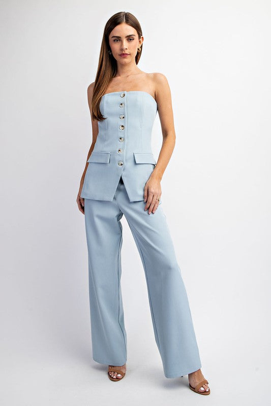 STYLED BY ALX COUTURE MIAMI BOUTIQUE Model is wearing Light blue Tailored Woven Pants with beige heels and a matching off shoulder tailored top 