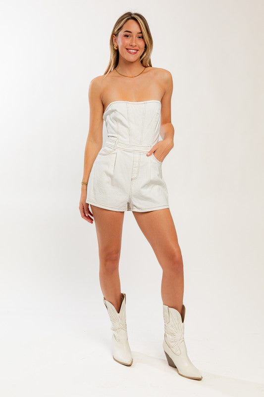 STYLED BY ALX COUTURE MIAMI BOUTIQUE Model is wearing White Denim Tube Romper with white cowboy boots 