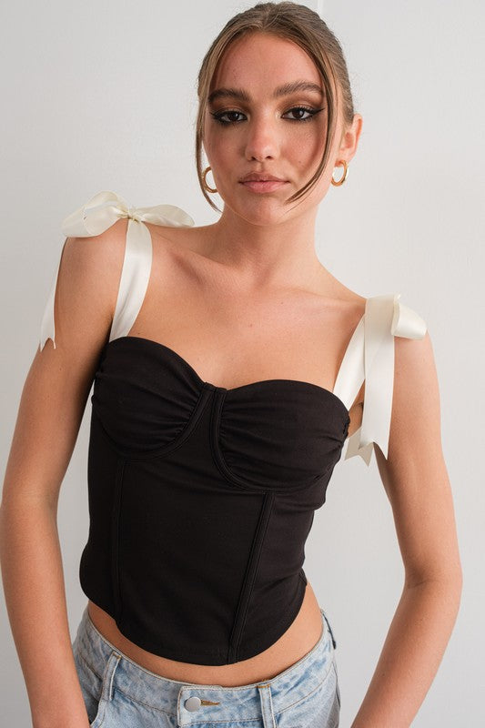 STYLED BY ALX COUTURE MIAMI BOUTIQUE Model is wearing Black Satin Ribbon Strap Detail Corset Top front view