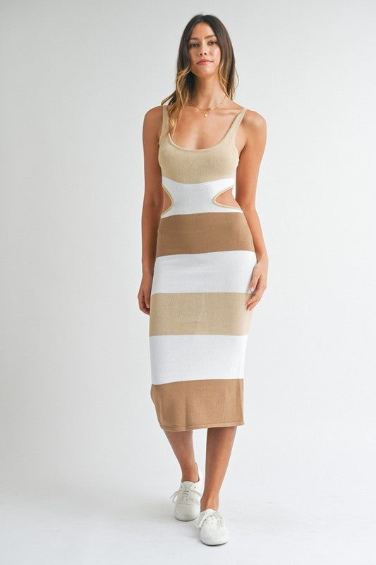 model is wearing Taupe Multi Color Block Backless Midi Dress with white sneakers 