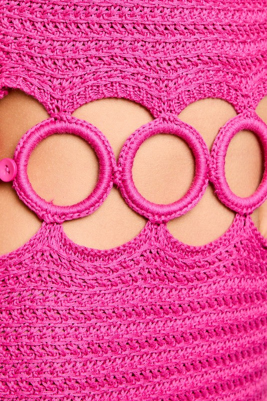close view of the crochet cutout detail of the Magenta Crochet Sleeveless Midi Dress 