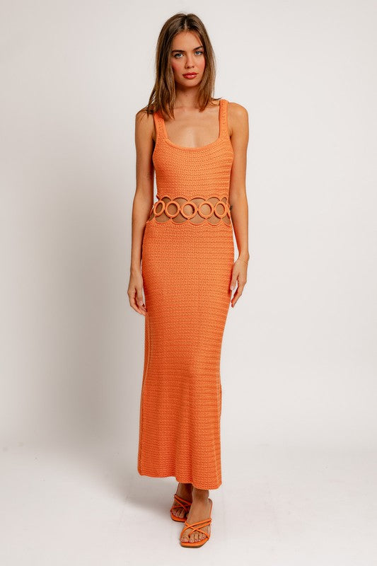 model is wearing Orange Crochet Sleeveless Midi Dress  with orange heel sandals