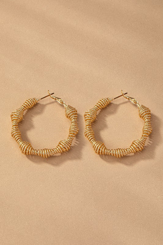 STYLED BY ALX COUTURE MIAMI BOUTIQUE Gold 2 inch Diamond Cut Wavy Coil Hoop Earrings