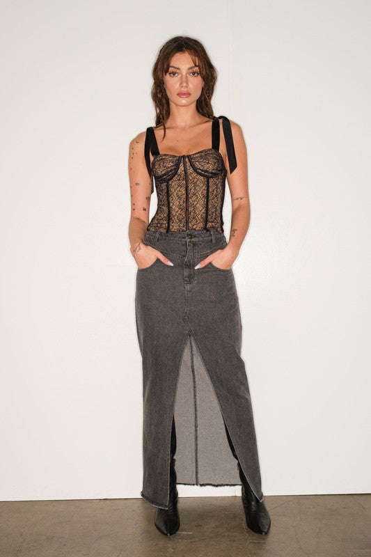 STYLED BY ALX COUTURE MIAMI BOUTIQUE Black Satin Strap Lace Bustier with long maxi denim skirt and long boots 