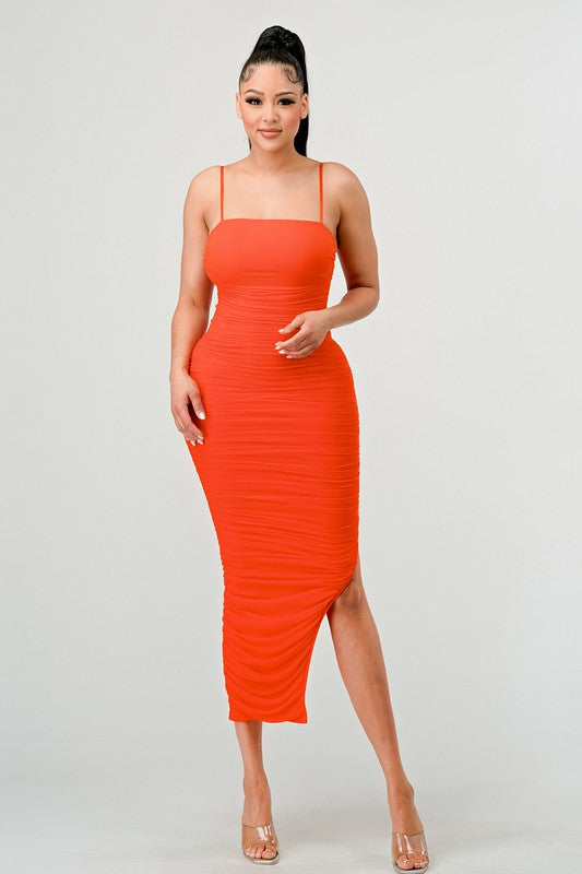 STYLED BY ALX COUTURE MIAMI BOUTIQUE Model is wearing Orange Lux Ruched Mesh Layer Side Open Slitted Midi Dress 