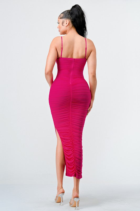 STYLED BY ALX COUTURE MIAMI BOUTIQUE Model is wearing True Hot Pink Lux Ruched Mesh Layer Side Open Slitted Midi Dress back view 