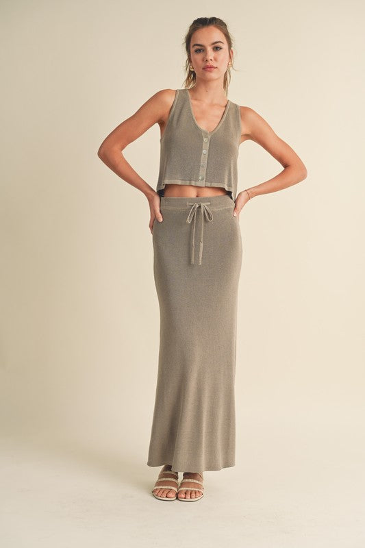 model is wearing Green Grey Knitted Maxi Skirt with beige heels sandals 