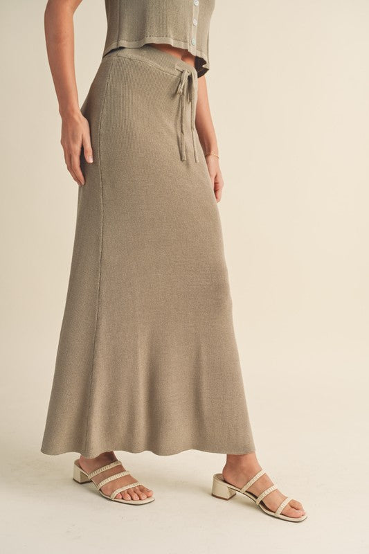 side of the Green Grey Knitted Maxi Skirt with beige heel sandals 