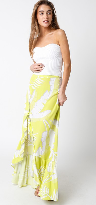 model is wearing Lime Cream Tianna Maxi Skirt with a white top 