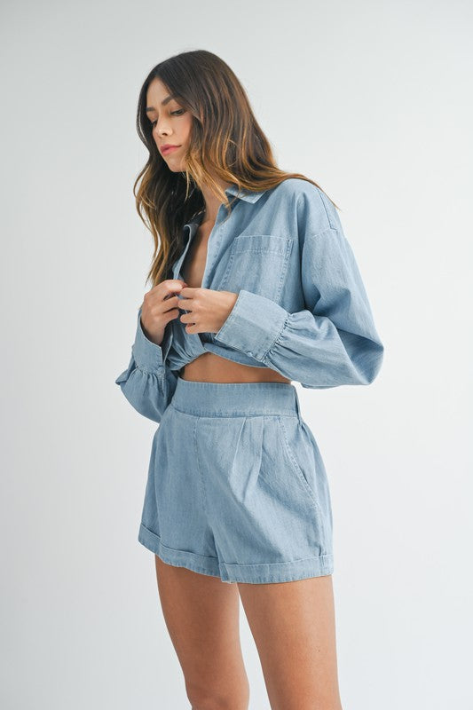 STYLED BY ALX COUTURE MIAMI BOUTIQUE Model is wearing Light Denim Long Sleeve Cropped Shirt and Shorts Set