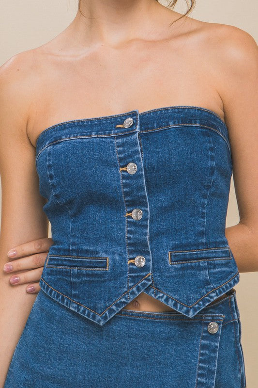 model is wearing Blue Denim Strapless Button-Up Top, close view of the top 