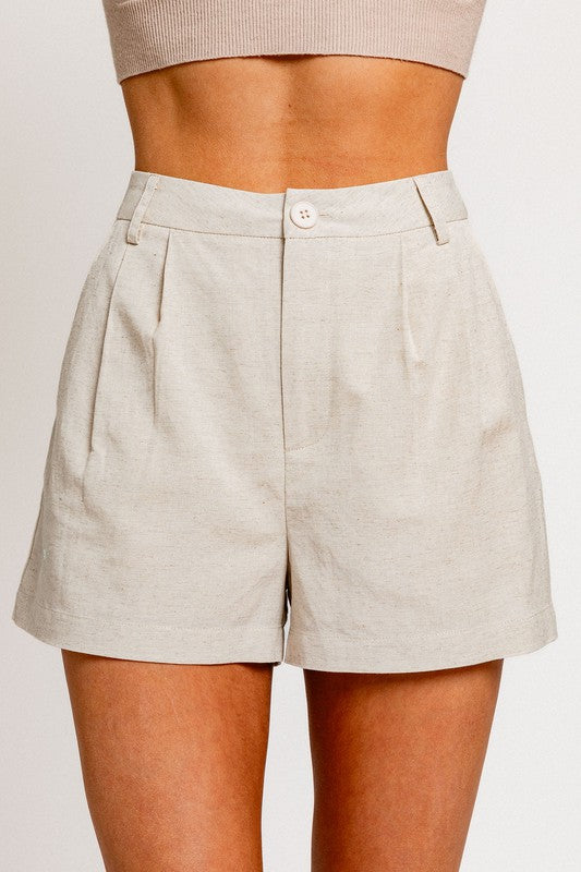 model is wearing Natural High Waist Pleated Shorts  and matching top 