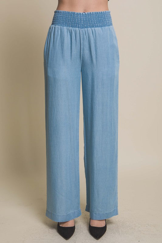 model is wearing Light Blue Casual Elastic Waistband Pants with black heels 