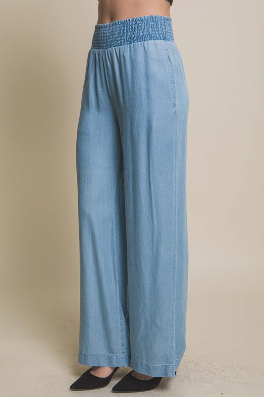 model is wearing Blue Casual Elastic Waistband Pants with black heels 