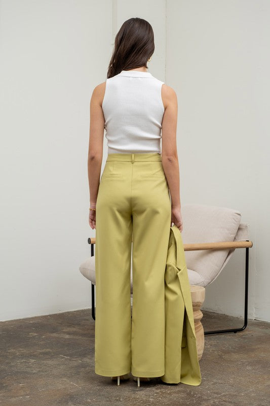 back of the model with Kiwi High Waisted Wide Leg Slacks and white top 