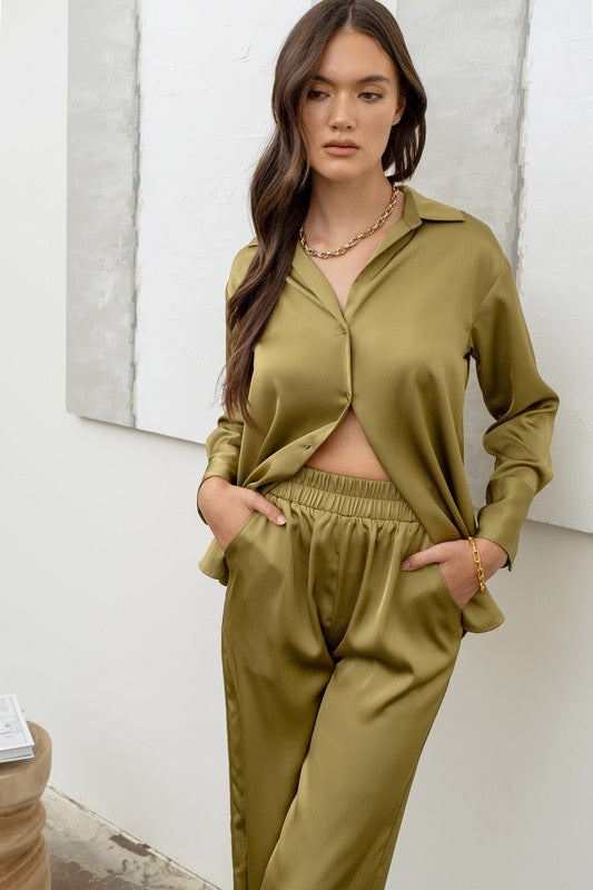 model wearing Light Olive Satin Button Up Top and matching pants 