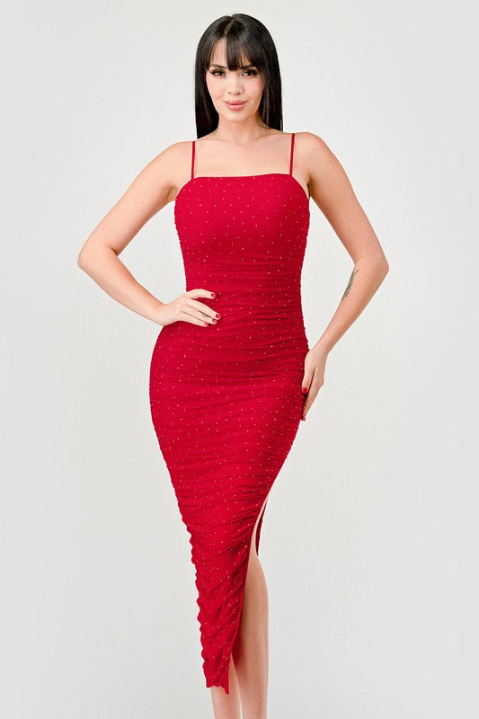 STYLED BY ALX COUTURE MIAMI BOUTIQUE Model is wearing Red Luxe Rhinestone Mesh Ruched Slited Midi Dress with high heels