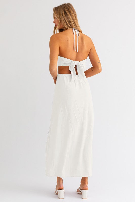 back of the White Halter Maxi Dress  and white heels 