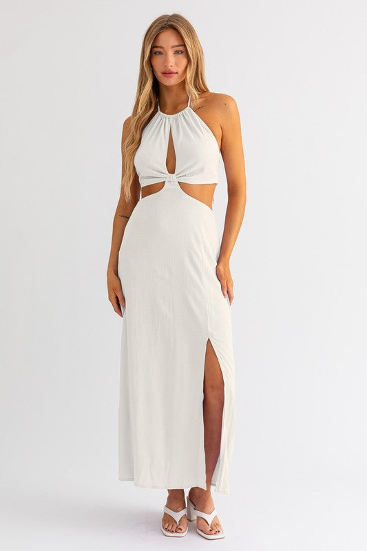 model is wearing White Halter Maxi Dress  and white heels 