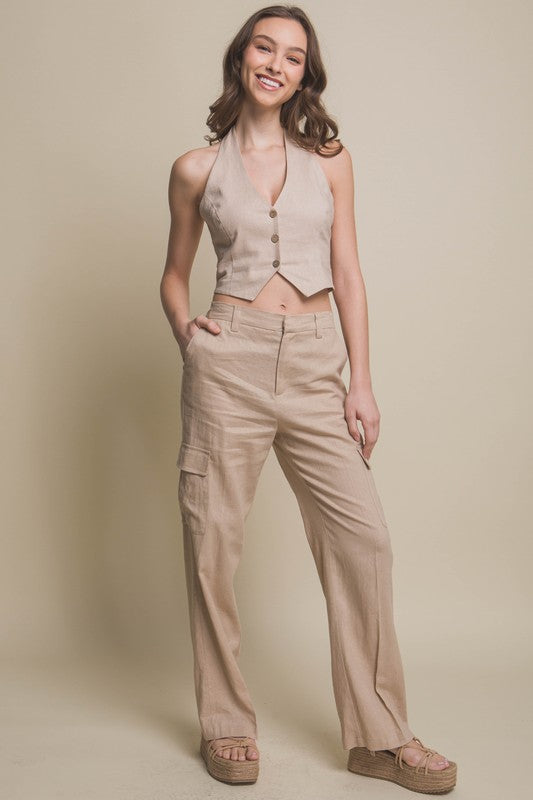 model is wearing Khaki Linen Cropped Vest with matching pants and wedges 