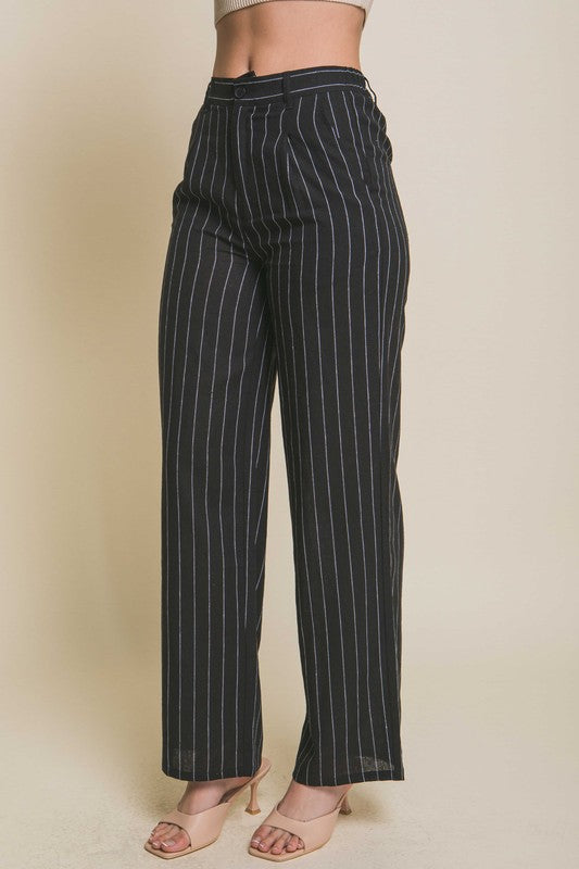 model is wearing the Black Linen Stripe Flannel Pants with beige heels sandals 