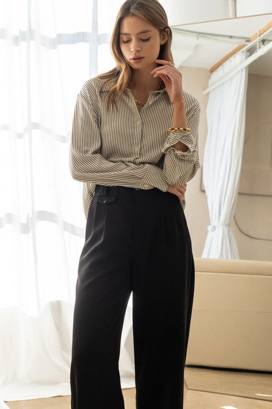 model is wearing Ivory Pinstripe Button Up Shirt and black trousers