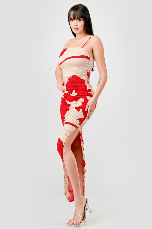STYLED BY ALX COUTURE MIAMI BOUTIQUE Model is wearing Nude Red Floral Ity Print Ruched Slitted Maxi Dress and high heels