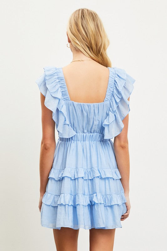 back view of the model wearing Light Blue Ruffle Tiered Dress