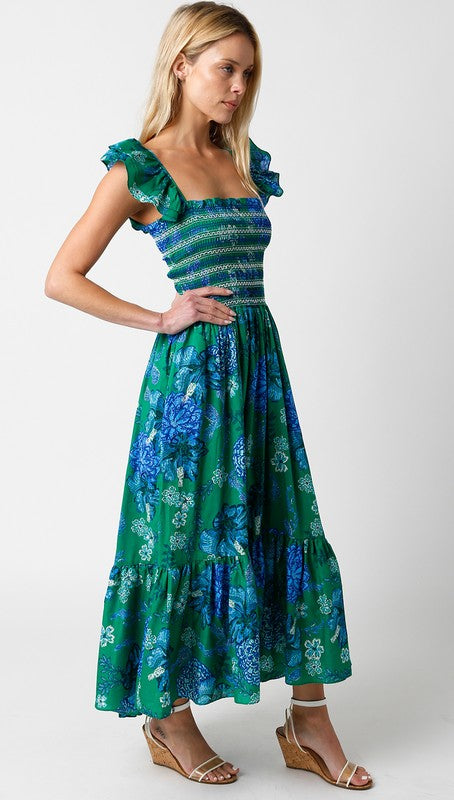 side of the model wearing Green Blue Layla Midi Dress and wedges
