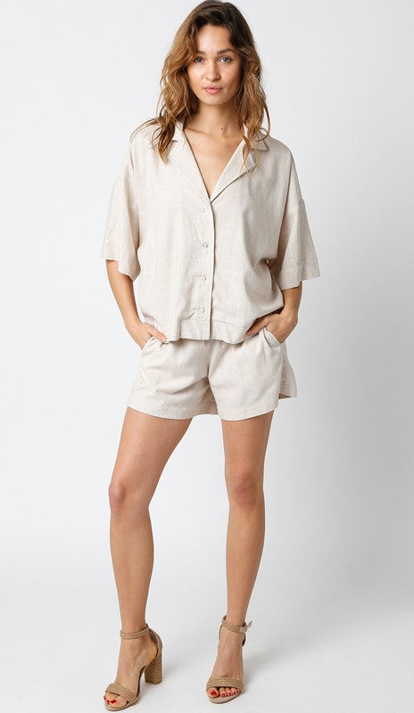 model is wearing Natural Aretha Shorts with matching shirt and natural heel sandals