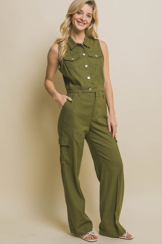 model is wearing Olive Linen Cargo Pants with matching vest and white sandals