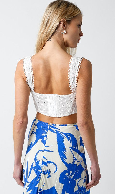 back of the White Cheyanne Top with blue palm print skirt