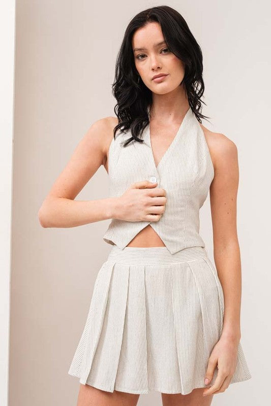 model is wearing the White Viscose Vest Skirt Set 