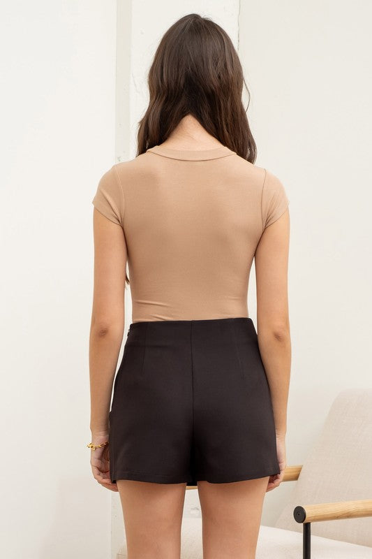 back of the Tan Round Neck Bodysuit and skort