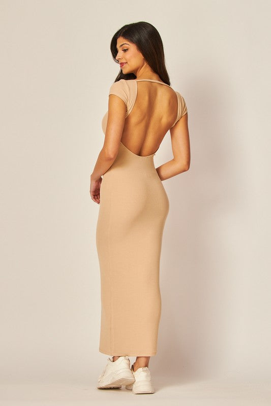 model is wearing Sand Open Back Maxi Dress, back view 